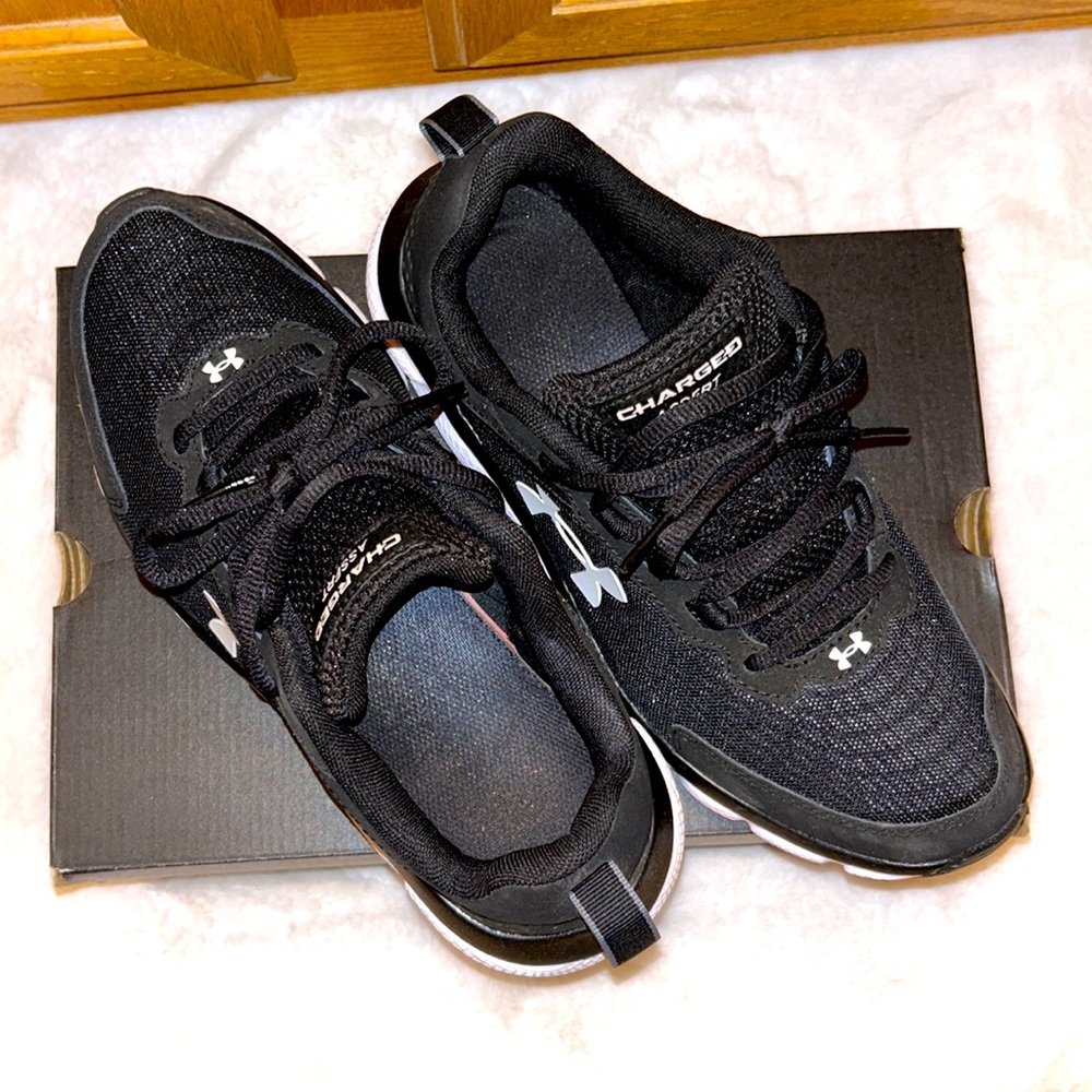 Under Armour tennis shoes, Black and white, Womans size 10 Men’s size 8